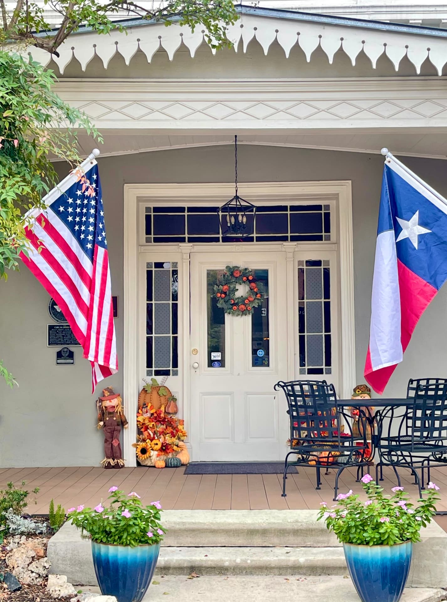 Flags on a Historic Texas Porch
